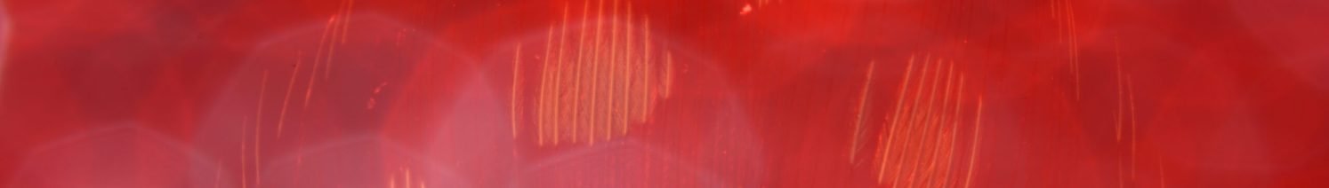 A red wallpaper with light bokeh